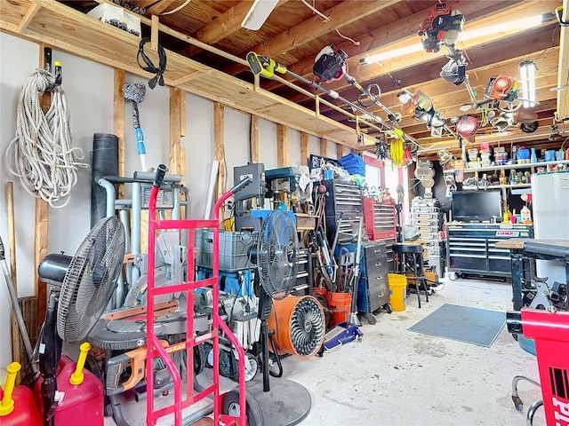 garage with a workshop area