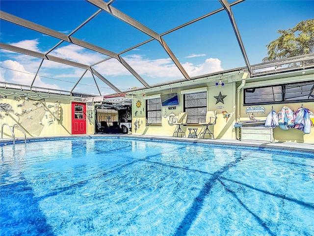 outdoor pool featuring a lanai