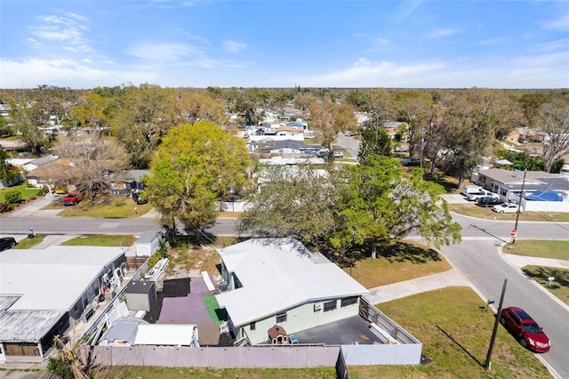 birds eye view of property with a residential view