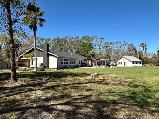 view of yard featuring fence