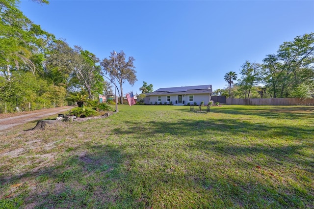 view of yard featuring fence