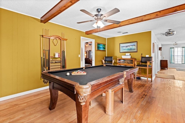 playroom featuring beam ceiling, pool table, light wood-style floors, a textured ceiling, and baseboards