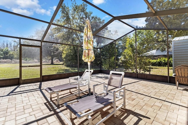 view of patio / terrace with a lanai