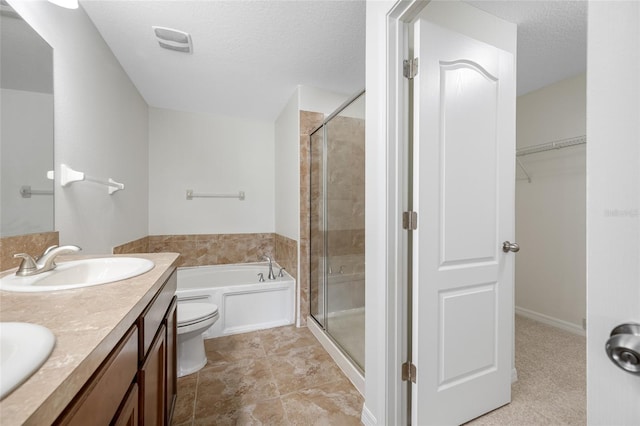 bathroom featuring visible vents, a sink, a shower stall, and a bath