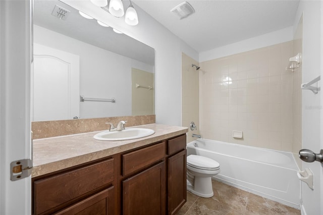 bathroom featuring washtub / shower combination, visible vents, vanity, and toilet