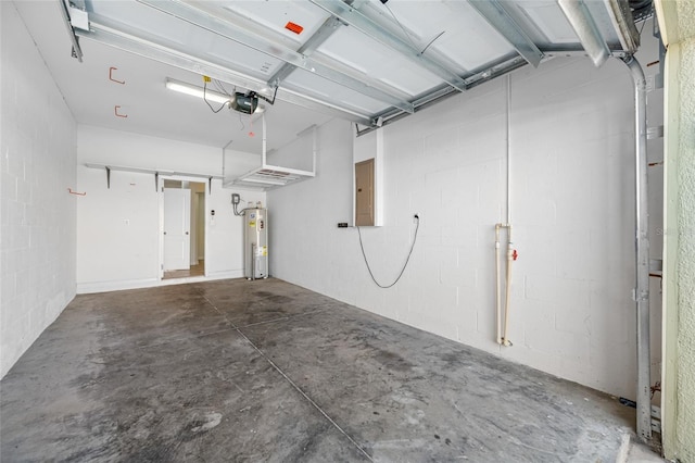 garage featuring electric panel, water heater, and a garage door opener