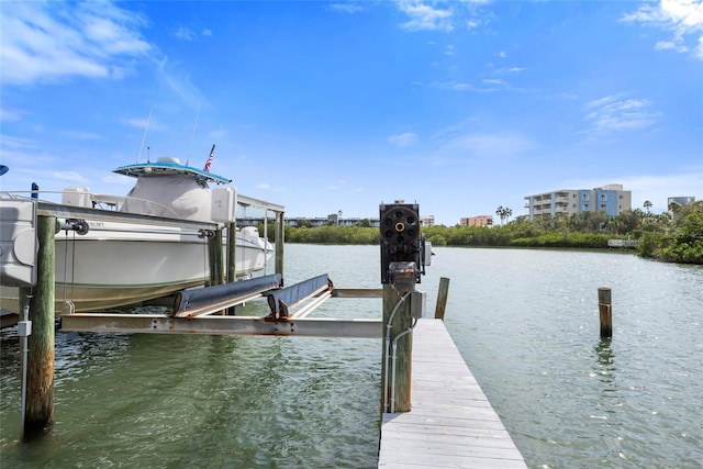 dock area featuring a water view and boat lift