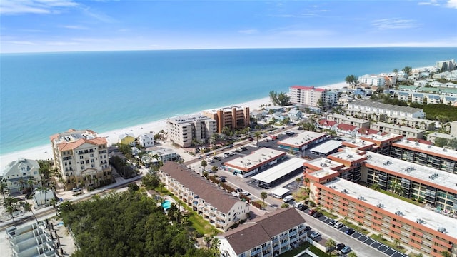 birds eye view of property featuring a water view and a city view