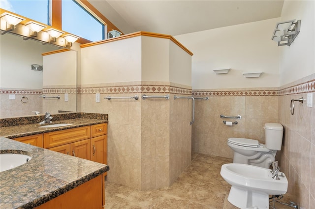 130 80th Ave NE, Saint Petersburg, FL 33702 - bathroom with toilet, tile walls, vanity, wainscoting, and tile patterned floors