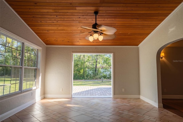 spare room featuring arched walkways, wooden ceiling, and crown molding