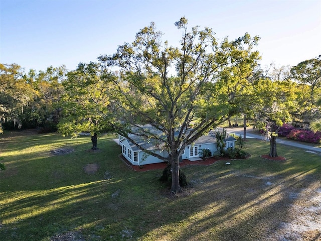 exterior space with a front lawn