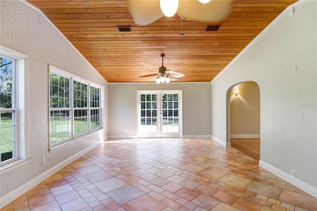 unfurnished room featuring lofted ceiling, light tile patterned floors, wood ceiling, and ceiling fan