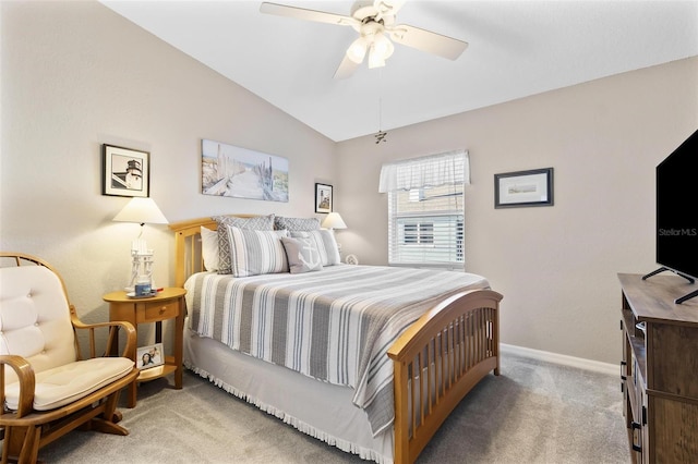 bedroom with lofted ceiling, ceiling fan, carpet, and baseboards