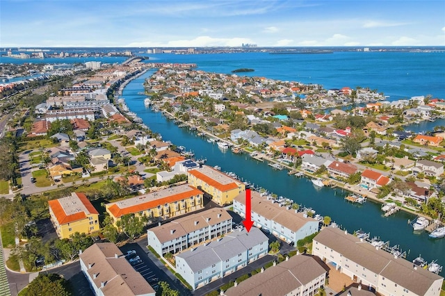 birds eye view of property with a residential view and a water view