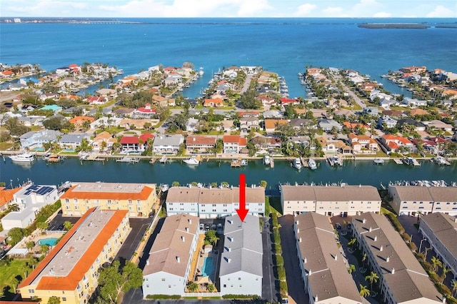 aerial view featuring a water view and a residential view