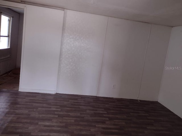 102 SE 6th Ave, Mulberry, FL 33860 - empty room featuring dark wood finished floors