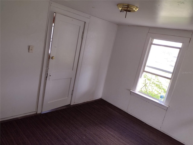 102 SE 6th Ave, Mulberry, FL 33860 - spare room featuring dark wood finished floors