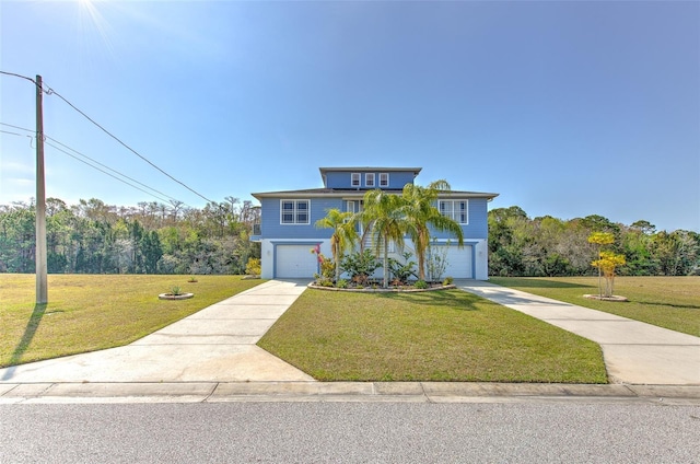 raised beach house with a garage, concrete driveway, and a front yard