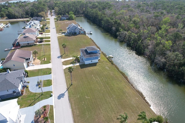 aerial view featuring a water view and a residential view