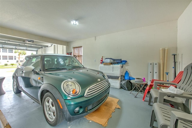 garage featuring concrete block wall