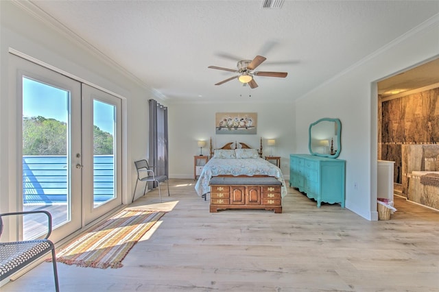 bedroom featuring access to exterior, light wood-type flooring, and ornamental molding