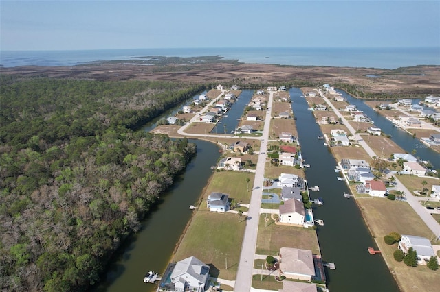 aerial view featuring a residential view and a water view