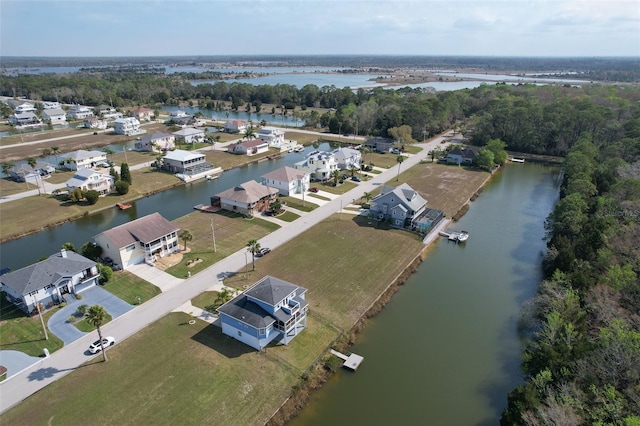 aerial view featuring a residential view and a water view