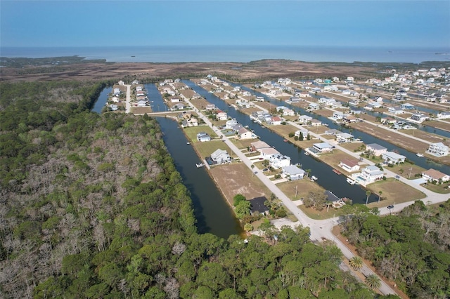 bird's eye view featuring a residential view and a water view