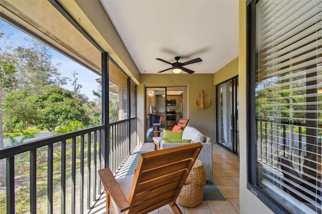 balcony featuring a ceiling fan