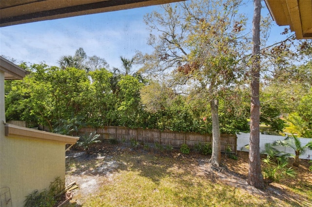 view of yard featuring fence