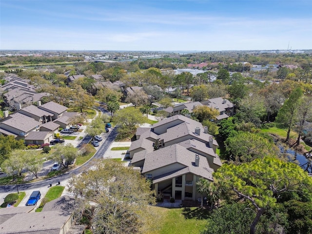 birds eye view of property with a residential view