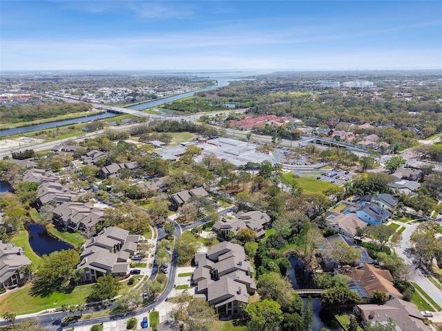 bird's eye view with a water view and a residential view