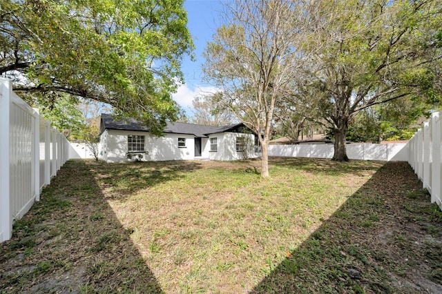 view of yard featuring a fenced backyard