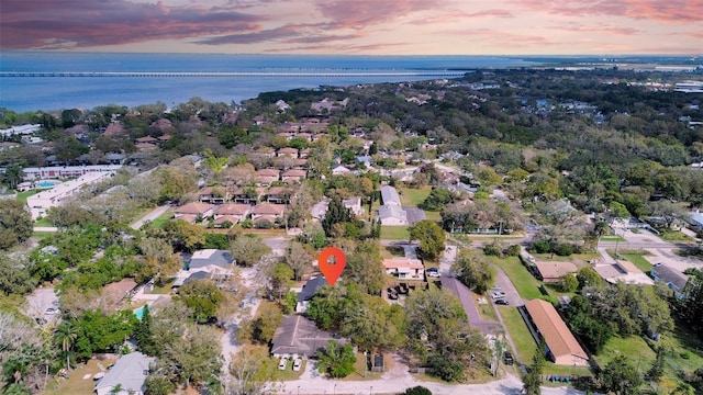 birds eye view of property featuring a residential view and a water view