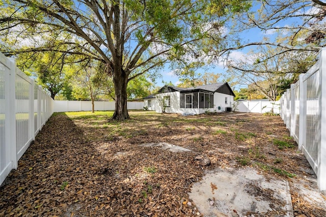 view of yard featuring a fenced backyard