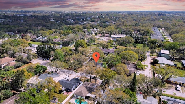 birds eye view of property with a residential view