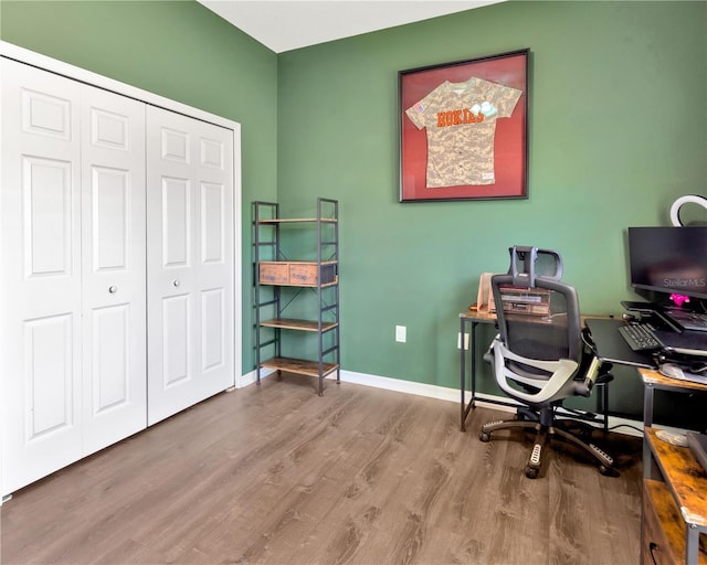 office with baseboards and wood finished floors