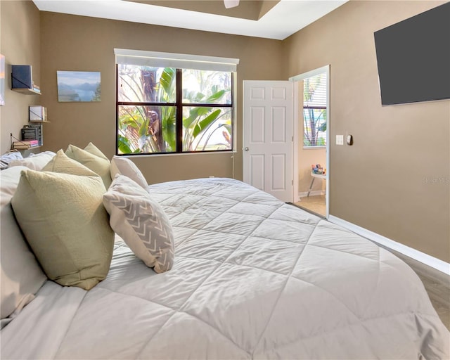 bedroom featuring baseboards