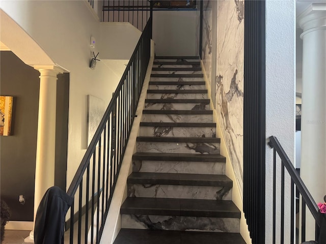 254 Chelsea Ave, Davenport, FL 33837 - stairway featuring ornate columns and a high ceiling