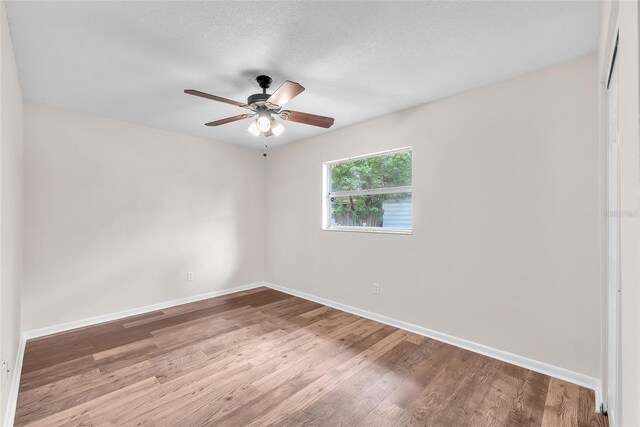 2412 Giddens Ave, Seffner, FL 33584 - empty room featuring wood finished floors and a ceiling fan