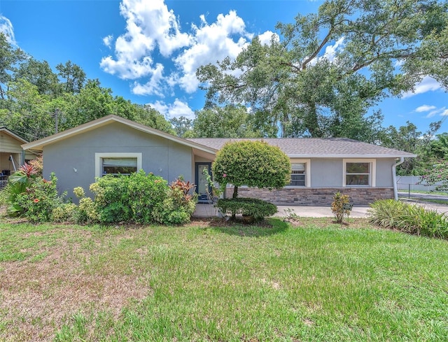 2412 Giddens Ave, Seffner, FL 33584 - single story home featuring stucco siding and stone siding