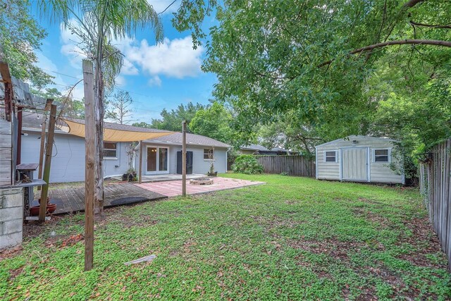 2412 Giddens Ave, Seffner, FL 33584 - fenced backyard with a storage shed