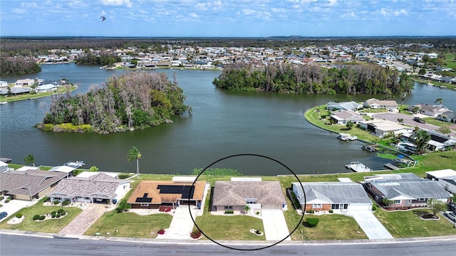 aerial view featuring a water view and a residential view