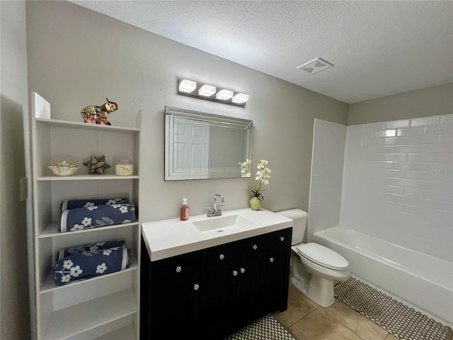 full bathroom with visible vents, toilet, a textured ceiling, vanity, and tile patterned flooring