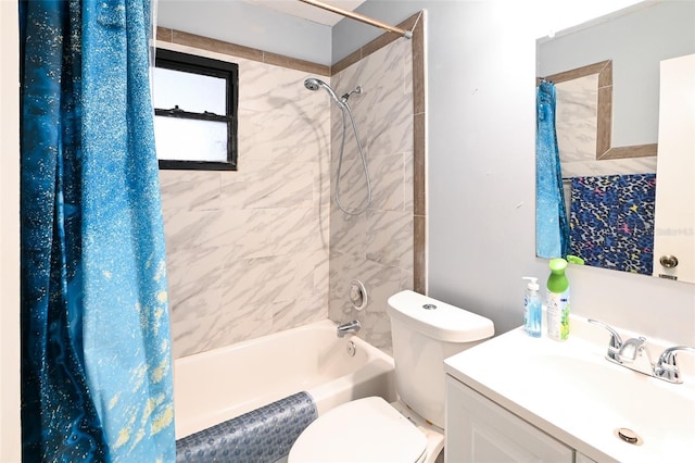 bathroom with toilet, shower / bath combo, and vanity