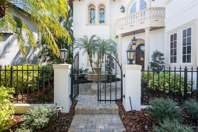 view of gate featuring a fenced front yard