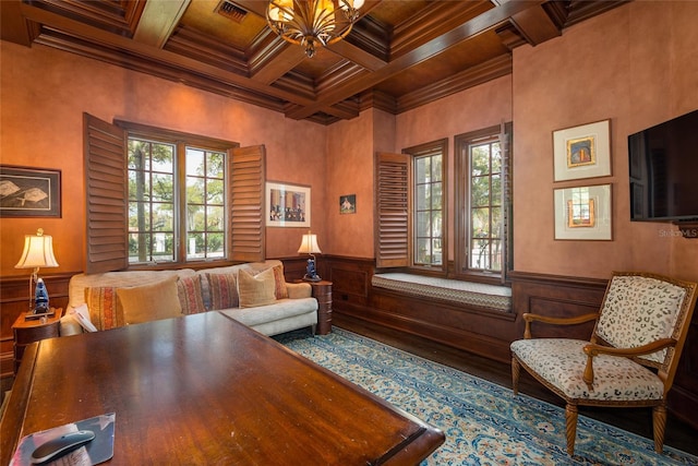 office space featuring crown molding, a wainscoted wall, and beamed ceiling