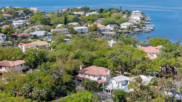 bird's eye view with a residential view and a water view