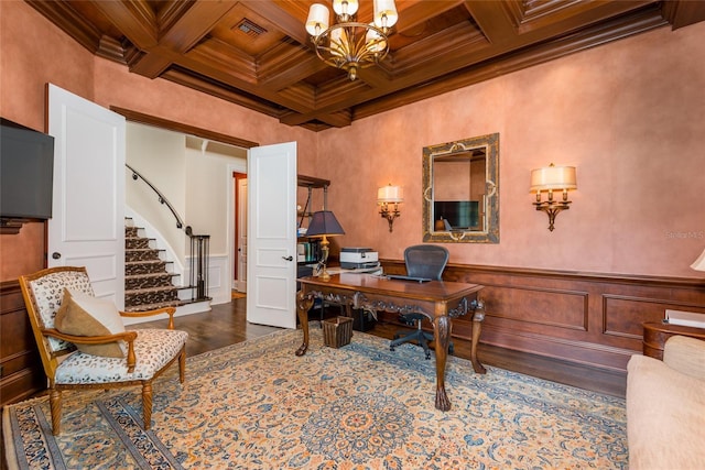 home office featuring a notable chandelier, beam ceiling, and crown molding