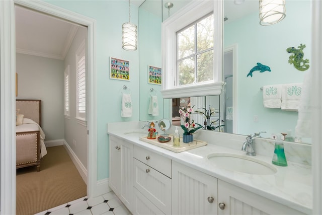 ensuite bathroom featuring ensuite bathroom, double vanity, a sink, and crown molding